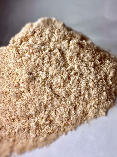 Wholegrain wheat flour in paper bag